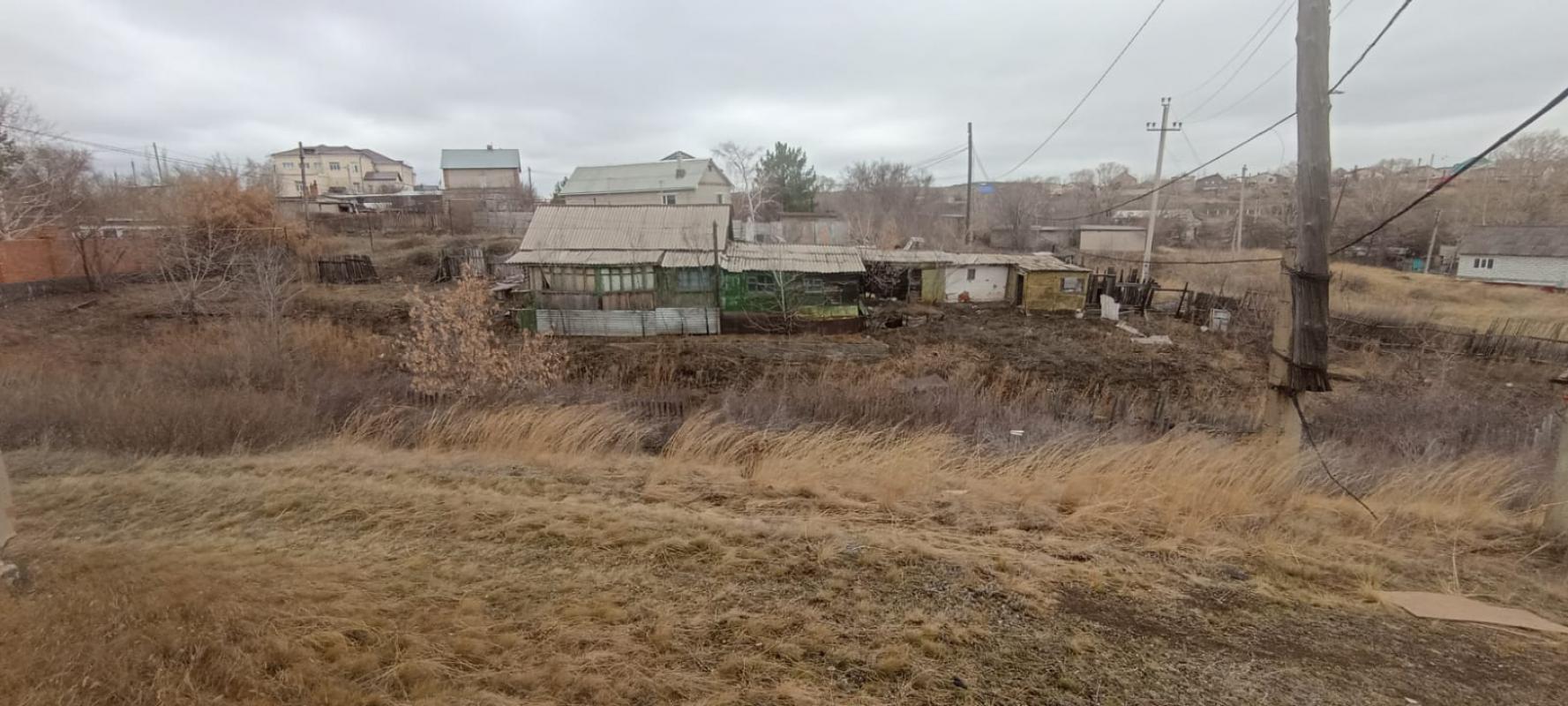 Дом с земельным участком, земля 1473 кв. - Новотроицк