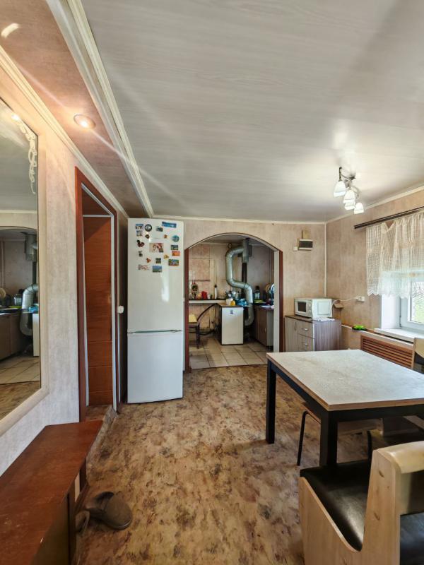 Продаётся одноэтажный деревянный дом, облицованный кирпичом, расположенный в городе Новотроицке на у - Новотроицк