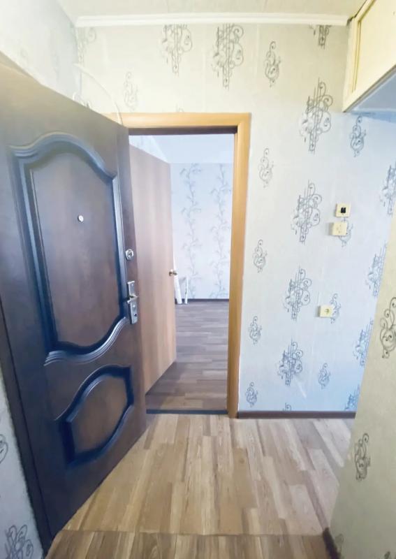 Продается 1-комнатная квартира на первом этаже пятиэтажного панельного дома по адресу: пр. - Новотроицк