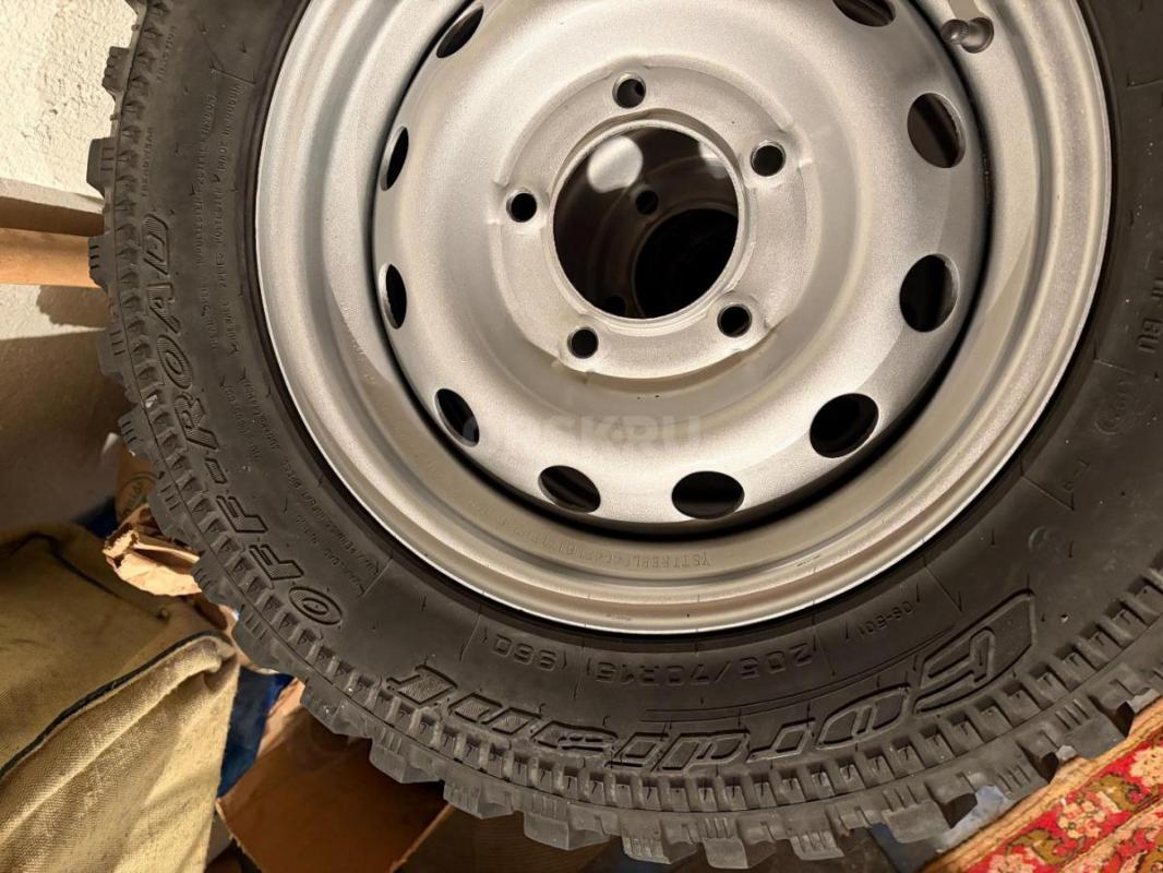 Продам шины 205/70 R 15  Cordiant  в сборе со штампованными дисками, стояли на автомобиле Шевроле Ни - Орск