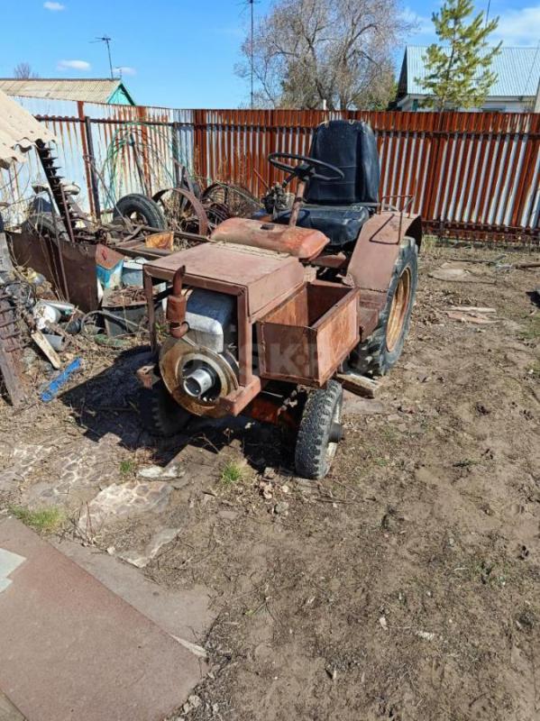 продам мини трактор много зап частей двигатель в запасе также конная косилка и конные грабли   цена - Орск