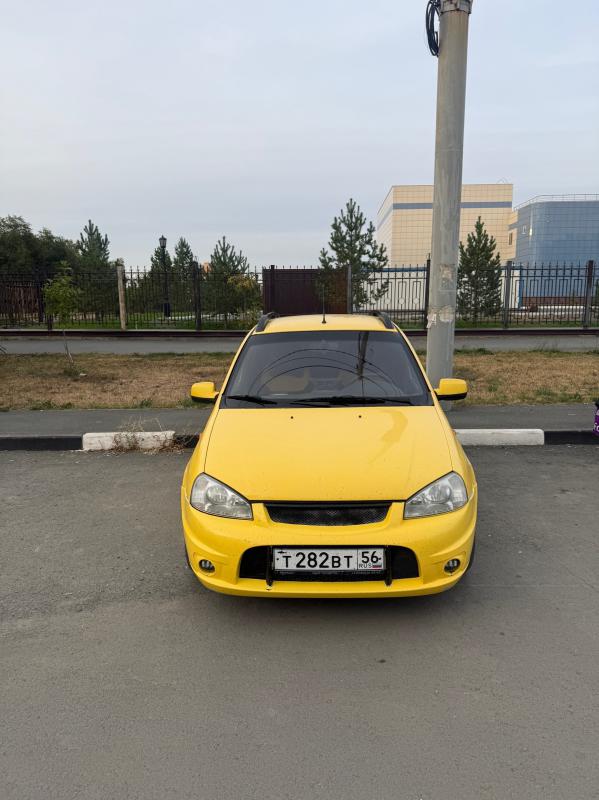В продаже Лада калина спорт 1, в очень красивом, ярком желтом цвете,установлен андроид планшет. - Новотроицк