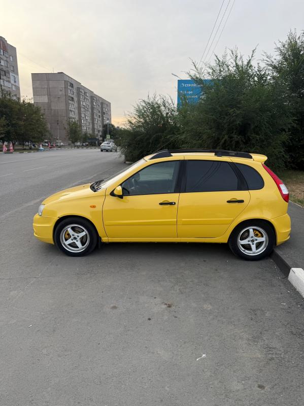 В продаже Лада калина спорт 1, в очень красивом, ярком желтом цвете,установлен андроид планшет. - Новотроицк