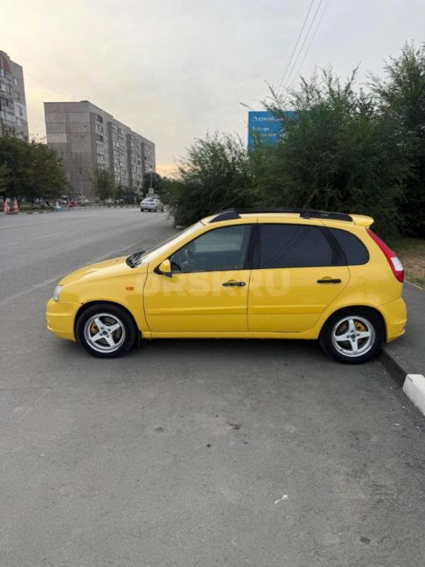 В продаже Лада калина спорт 1, в очень красивом, ярком желтом цвете,установлен андроид планшет. - Орск